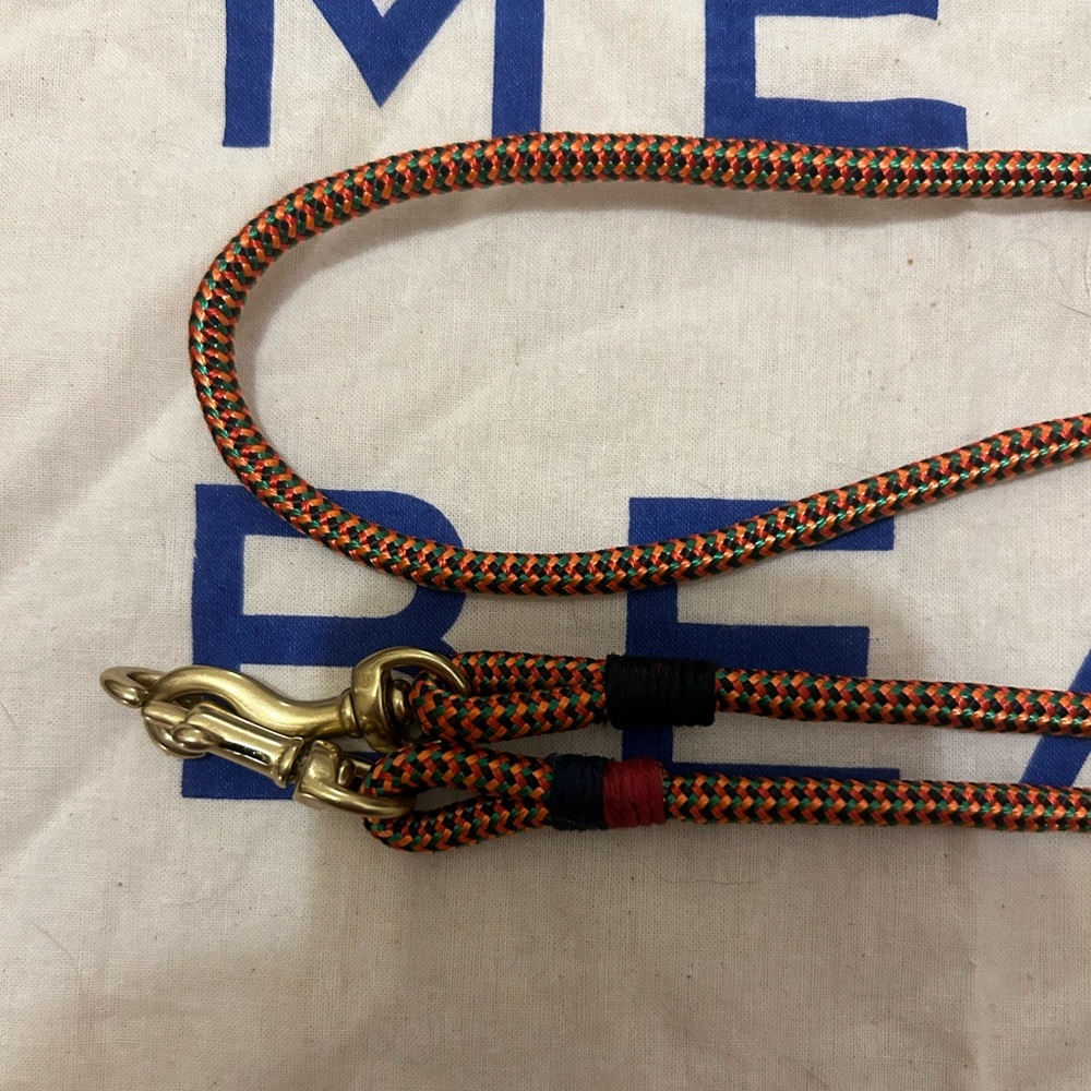 Clare V orange multi sail cord crossbody strap